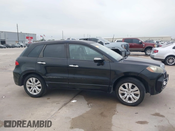 2010 Acura RDX with VIN 5J8TB2H29AA001038, listed as a IAAI auction lot 41235246 with 158,991 mi miles. Bid and sale history available at carsss.com. Image 13.