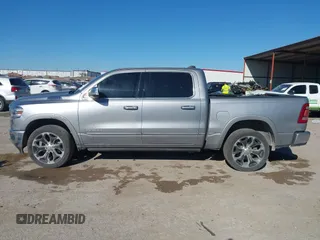 2019 Ram 1500 Limited z VIN 1C6SRFHTXKN774690, wystawiony jako IAAI lot #41860299 z przebiegiem 134 857 mil mil oraz . Historia ofert i sprzedaży dostępna na DreamBid. Obrazek 14.
