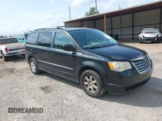 2010 Chrysler Town & Country Touring with VIN 2A4RR5DX5AR329523, listed as a IAAI auction lot 41941874 with 207,079 mi miles. Bid and sale history available at carsss.com. Image 1.
