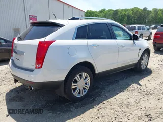 2012 Cadillac SRX Luxury Collection with VIN 3GYFNAE36CS629404, listed as a IAAI auction lot 42077679 with 146,000 mi miles. Bid and sale history available at carsss.com. Image 4.