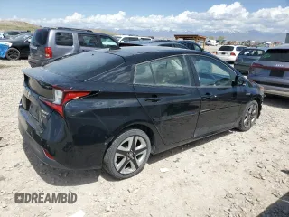 2020 Toyota Prius L Eco z VIN JTDKARFU7L3111913, wystawiony jako Copart lot #54544995 z przebiegiem 85 988 mil mil oraz Szkoda całkowita • Salvage title. Historia ofert i sprzedaży dostępna na DreamBid. Obrazek 3.