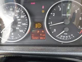 2007 BMW 3 Series 328xi with VIN WBAVC93547KX60002, listed as a IAAI auction lot 42671666 with 162,321 mi miles and . Bid and sale history available at DreamBid. Image 7.
