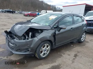 2015 Ford Fiesta SE with VIN 3FADP4EJ0FM117739, listed as a IAAI auction lot 41795558 with 111,000 mi miles. Bid and sale history available at carsss.com. Image 17.