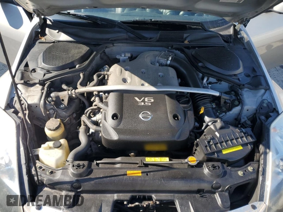 2004 Nissan 350Z Enthusiast z VIN JN1AZ36A54T015600, wystawiony jako Copart lot #53322995 z przebiegiem 114 850 mil mil oraz Czysty tytuł • Clean title. Historia ofert i sprzedaży dostępna na DreamBid. Obrazek 11.