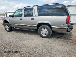 1999 Chevrolet Suburban z VIN 3GNFK16R2XG191868, wystawiony jako Copart lot #57620165 z przebiegiem 128 526 mil mil oraz Szkoda całkowita • Salvage title. Historia ofert i sprzedaży dostępna na DreamBid. Obrazek 2.