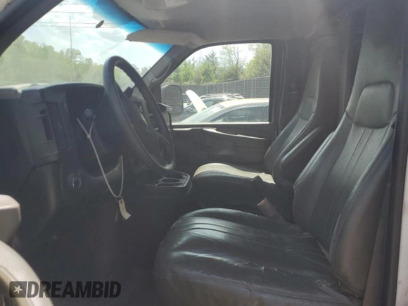 2013 Chevrolet Express Cargo with VIN 1GCWGFBA4D1110306, listed as a Copart auction lot 54005335 with 300,748 mi miles and Salvage title. Bid and sale history available at DreamBid. Image 7.