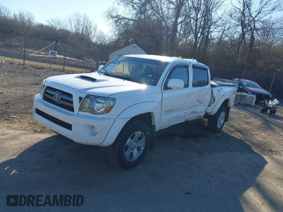 2009 Toyota Tacoma z VIN 5TEMU52N99Z621200, wystawiony jako IAAI lot #41318515 z przebiegiem 157 034 mil mil oraz . Historia ofert i sprzedaży dostępna na DreamBid. Obrazek 2.