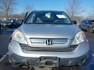 2009 Honda CR-V EX with VIN 3CZRE38589G704086, listed as a IAAI auction lot 41348951 with 128,784 mi miles and . Bid and sale history available at carsss.com. Image 12.