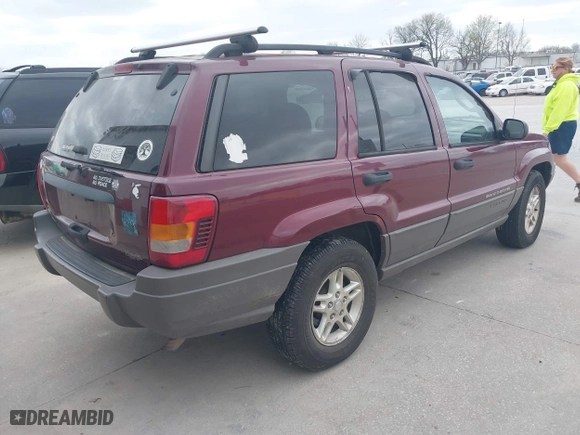 2003 Jeep Grand Cherokee Laredo with VIN 1J4GW48S83C563627, listed as a IAAI auction lot 41910225 with 150,264 mi miles. Bid and sale history available at carsss.com. Image 4.