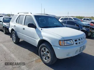 2000 Isuzu Rodeo S z VIN 4S2CK58W8Y4300441, wystawiony jako IAAI lot #42271723 z przebiegiem 278 324 mil mil oraz . Historia ofert i sprzedaży dostępna na DreamBid. Obrazek 1.