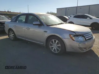 2008 Ford Taurus SEL with VIN 1FAHP24W98G107727, listed as a Copart auction lot 71554324 with 202,777 mi miles and Salvage Title. Bid and sale history available at carsss.com. Image 4.