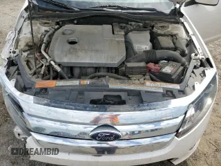 2012 Ford Fusion Hybrid с VIN 3FADP0L35CR184476, выставлен на аукционе Copart как лот 63907885 с пробегом 230 589 миль миль и Списание • Salvage title. История ставок и продаж доступна на DreamBid. Изображение 11.