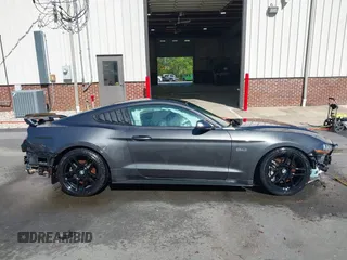2018 Ford Mustang GT z VIN 1FA6P8CF3J5182601, wystawiony jako IAAI lot #41661225 z przebiegiem 67 898 mil mil oraz . Historia ofert i sprzedaży dostępna na DreamBid. Obrazek 14.
