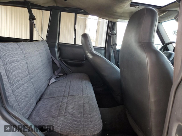 2000 Jeep Cherokee with VIN 1J4FF48S7YL221475, listed as a Copart auction lot 53005275 with 273,246 mi miles and Clean title. Bid and sale history available at DreamBid. Image 11.