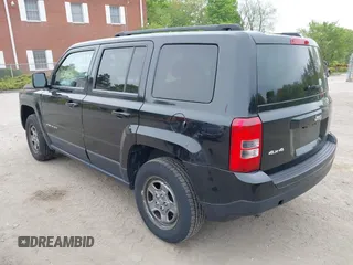 2014 Jeep Patriot Sport with VIN 1C4NJRBB3ED879757, listed as a IAAI auction lot 42241511 with 126,135 mi miles and . Bid and sale history available at carsss.com. Image 3.