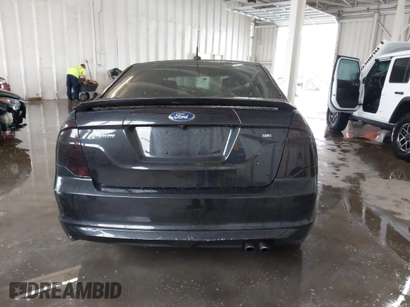 2012 Ford Fusion SE z VIN 3FAHP0HA5CR403929, wystawiony jako IAAI lot #42353429 z przebiegiem 208 668 mil mil oraz . Historia ofert i sprzedaży dostępna na DreamBid. Obrazek 16.