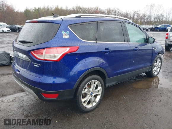 2014 Ford Escape Titanium with VIN 1FMCU9J99EUA46103, listed as a IAAI auction lot 42018097 with 169,878 mi miles and . Bid and sale history available at DreamBid. Image 4.