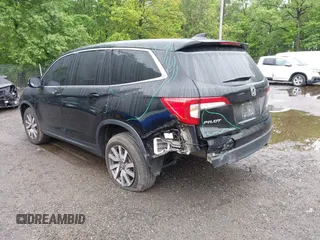 2022 Honda Pilot EX-L with VIN 5FNYF6H58NB018372, listed as a IAAI auction lot 42327580 with 79,332 mi miles and . Bid and sale history available at DreamBid. Image 3.