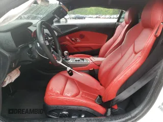 2018 Audi R8 V10 z VIN WUABAAFX5J7902445, wystawiony jako Copart lot #56587934 z przebiegiem Nie podano mil oraz Szkody całkowita. Historia ofert i sprzedaży dostępna na DreamBid. Obrazek 7.