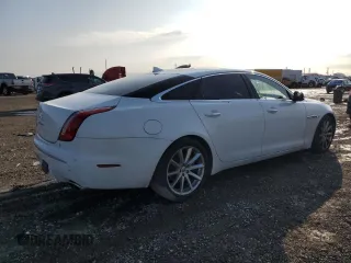 2014 Jaguar XJ Portfolio with VIN SAJWA2GZ3E8V60788, listed as a Copart auction lot 43272405 with 97,196 mi miles and Salvage title. Bid and sale history available at DreamBid. Image 3.