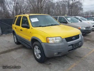 2001 Ford Escape XLT with VIN 1FMYU04171KE58419, listed as a IAAI auction lot 41723939 with 176,759 mi miles. Bid and sale history available at carsss.com. Image 1.