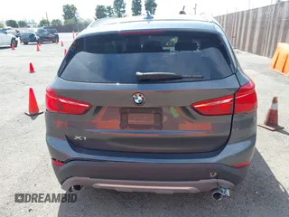 2018 BMW X1 xDrive28i with VIN WBXHT3C30J5L34702, listed as a IAAI auction lot 41935803 with 42,174 mi miles. Bid and sale history available at carsss.com. Image 16.