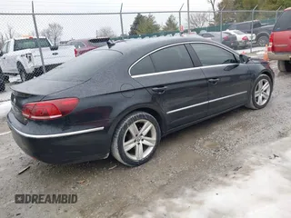 2013 Volkswagen CC Sport with VIN WVWBP7AN2DE506977, listed as a IAAI auction lot 41440929 with 62,385 mi miles. Bid and sale history available at carsss.com. Image 4.