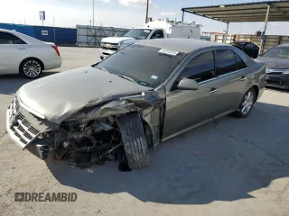 2010 Cadillac STS AWD with VIN 1G6DU6EV7A0106852, listed as a Copart auction lot 83353204 with 166,316 mi miles and Salvage Title. Bid and sale history available at carsss.com. Image 1.