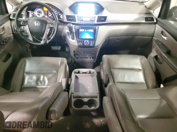 2014 Honda Odyssey Touring z VIN 5FNRL5H91EB128917, wystawiony jako Copart lot #49353085 z przebiegiem 208 871 mil mil oraz Czysty tytuł • Clean title. Historia ofert i sprzedaży dostępna na DreamBid. Obrazek 8.