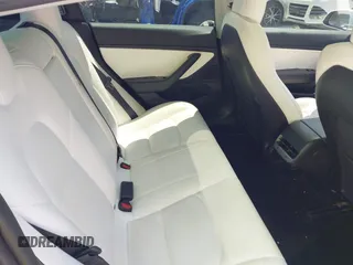 2019 Tesla Model 3 Long Range with VIN 5YJ3E1EB4KF494432, listed as a IAAI auction lot 42009327 with 121,954 mi miles and . Bid and sale history available at DreamBid. Image 8.