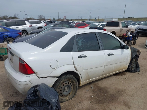 2007 Ford Focus S z VIN 1FAFP34N97W185370, wystawiony jako IAAI lot #41692669 z przebiegiem Nie podano mil oraz . Historia ofert i sprzedaży dostępna na DreamBid. Obrazek 4.