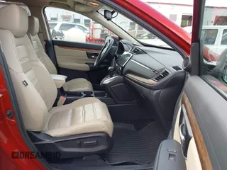 2018 Honda CR-V EX-L z VIN 2HKRW2H83JH651686, wystawiony jako IAAI lot #42356284 z przebiegiem 60 550 mil mil oraz . Historia ofert i sprzedaży dostępna na DreamBid. Obrazek 5.
