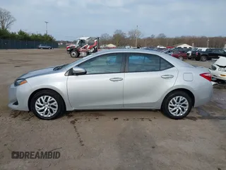 2019 Toyota Corolla L with VIN 5YFBURHE2KP934042, listed as a IAAI auction lot 41963491 with 87,299 mi miles. Bid and sale history available at carsss.com. Image 15.