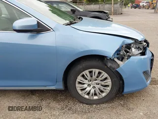 2012 Toyota Camry L z VIN 4T1BF1FK7CU561214, wystawiony jako IAAI lot #42286118 z przebiegiem 182 553 mil mil oraz . Historia ofert i sprzedaży dostępna na DreamBid. Obrazek 17.