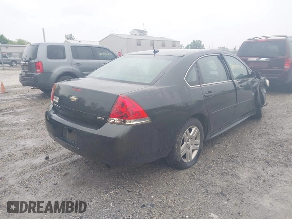 2014 Chevrolet Impala LT z VIN 2G1WB5E35E1128453, wystawiony jako IAAI lot #42388474 z przebiegiem 99 665 mil mil oraz . Historia ofert i sprzedaży dostępna na DreamBid. Obrazek 4.