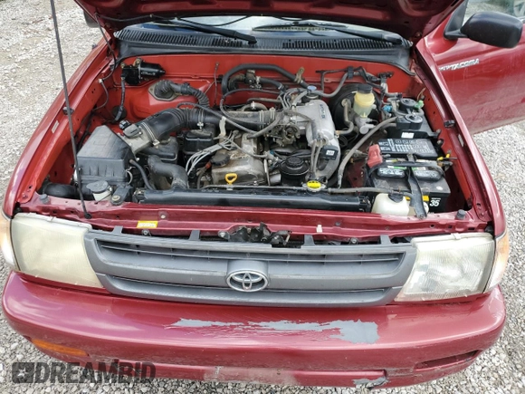 1999 Toyota Tacoma z VIN 4TANL42N4XZ435246, wystawiony jako Copart lot #56843025 z przebiegiem 197 295 mil mil oraz Szkoda całkowita • Salvage title. Historia ofert i sprzedaży dostępna na DreamBid. Obrazek 11.