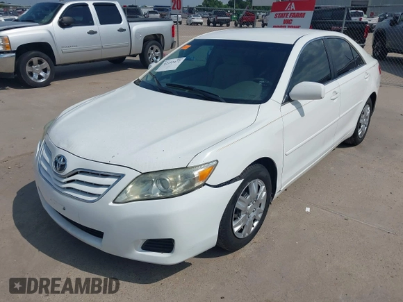 2010 Toyota Camry with VIN 4T1BF3EK2AU555959, listed as a IAAI auction lot 42153472 with 288,387 mi miles and . Bid and sale history available at DreamBid. Image 2.