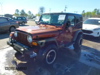 2003 Jeep Wrangler Sport with VIN 1J4FA49S33P345192, listed as a IAAI auction lot 41801344 with 196,472 mi miles. Bid and sale history available at carsss.com. Image 17.
