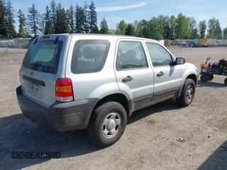 2006 Ford Escape XLS with VIN 1FMYU92Z46KD25072, listed as a IAAI auction lot 42132084 with 52,921 mi miles. Bid and sale history available at carsss.com. Image 4.
