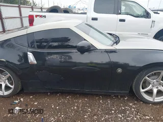 2009 Nissan 370Z Touring with VIN JN1AZ44E69M404341, listed as a IAAI auction lot 41907551 with 144,612 mi miles and . Bid and sale history available at DreamBid. Image 13.