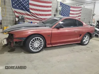 1996 Ford Mustang GT z VIN 1FALP42XXTF217850, wystawiony jako Copart lot #52391385 z przebiegiem 171 682 mil mil oraz Szkoda całkowita • Salvage title. Historia ofert i sprzedaży dostępna na DreamBid. Obrazek 1.