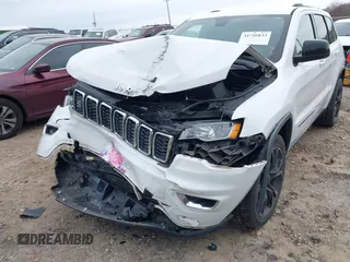 2018 Jeep Grand Cherokee Laredo E with VIN 1C4RJEAG7JC322888, listed as a IAAI auction lot 41756833 with 129,988 mi miles and . Bid and sale history available at DreamBid. Image 6.