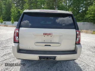 2015 GMC Yukon XL SLE z VIN 1GKS1GKC6FR203201, wystawiony jako Copart lot #53888885 z przebiegiem 202 601 mil mil oraz Szkoda całkowita • Salvage title. Historia ofert i sprzedaży dostępna na DreamBid. Obrazek 6.