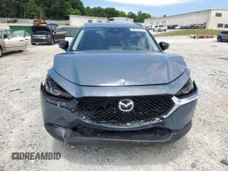 2023 Mazda CX-30 Premium with VIN 3MVDMBDY1PM509621, listed as a Copart auction lot 58316715 with 27,979 mi miles and Salvage title. Bid and sale history available at DreamBid. Image 5.