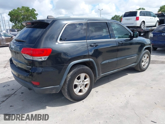 2014 Jeep Grand Cherokee Laredo with VIN 1C4RJEAG6EC136832, listed as a IAAI auction lot 42258348 with 151,647 mi miles and . Bid and sale history available at DreamBid. Image 4.