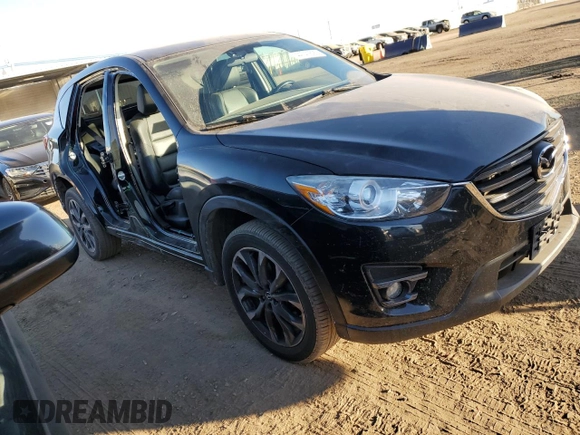 2016 Mazda CX-5 Grand Touring with VIN JM3KE4DY0G0731384, listed as a Copart auction lot 44741695 with 58,727 mi miles and Salvage Title. Bid and sale history available at carsss.com. Image 4.