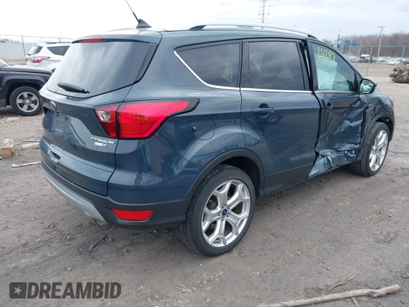 2019 Ford Escape Titanium with VIN 1FMCU9J95KUC28621, listed as a IAAI auction lot 41825297 with 60,373 mi miles. Bid and sale history available at carsss.com. Image 4.