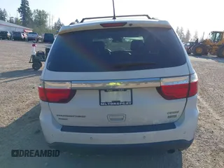 2013 Dodge Durango Crew with VIN 1C4RDJDG3DC664855, listed as a IAAI auction lot 42109159 with 148,440 mi miles and . Bid and sale history available at DreamBid. Image 16.