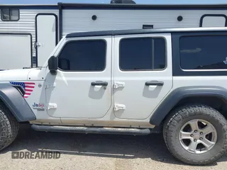 2018 Jeep Wrangler Unlimited Sport S with VIN 1C4HJXDG8JW127299, listed as a IAAI auction lot 42091561 with 116,082 mi miles and . Bid and sale history available at DreamBid. Image 14.