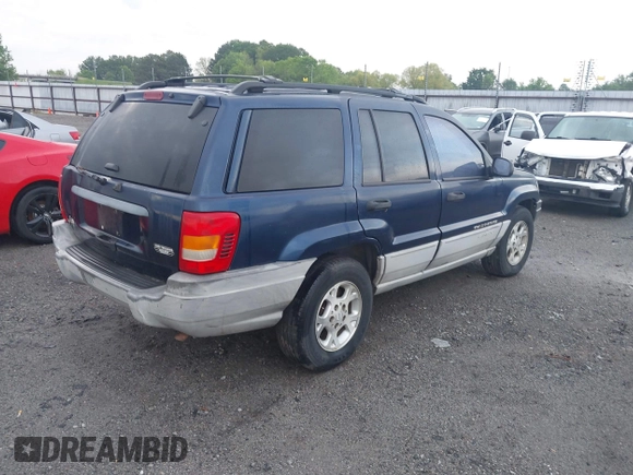 2000 Jeep Grand Cherokee Laredo with VIN 1J4G248S4YC144404, listed as a IAAI auction lot 42114635 with 181,854 mi miles and . Bid and sale history available at DreamBid. Image 4.